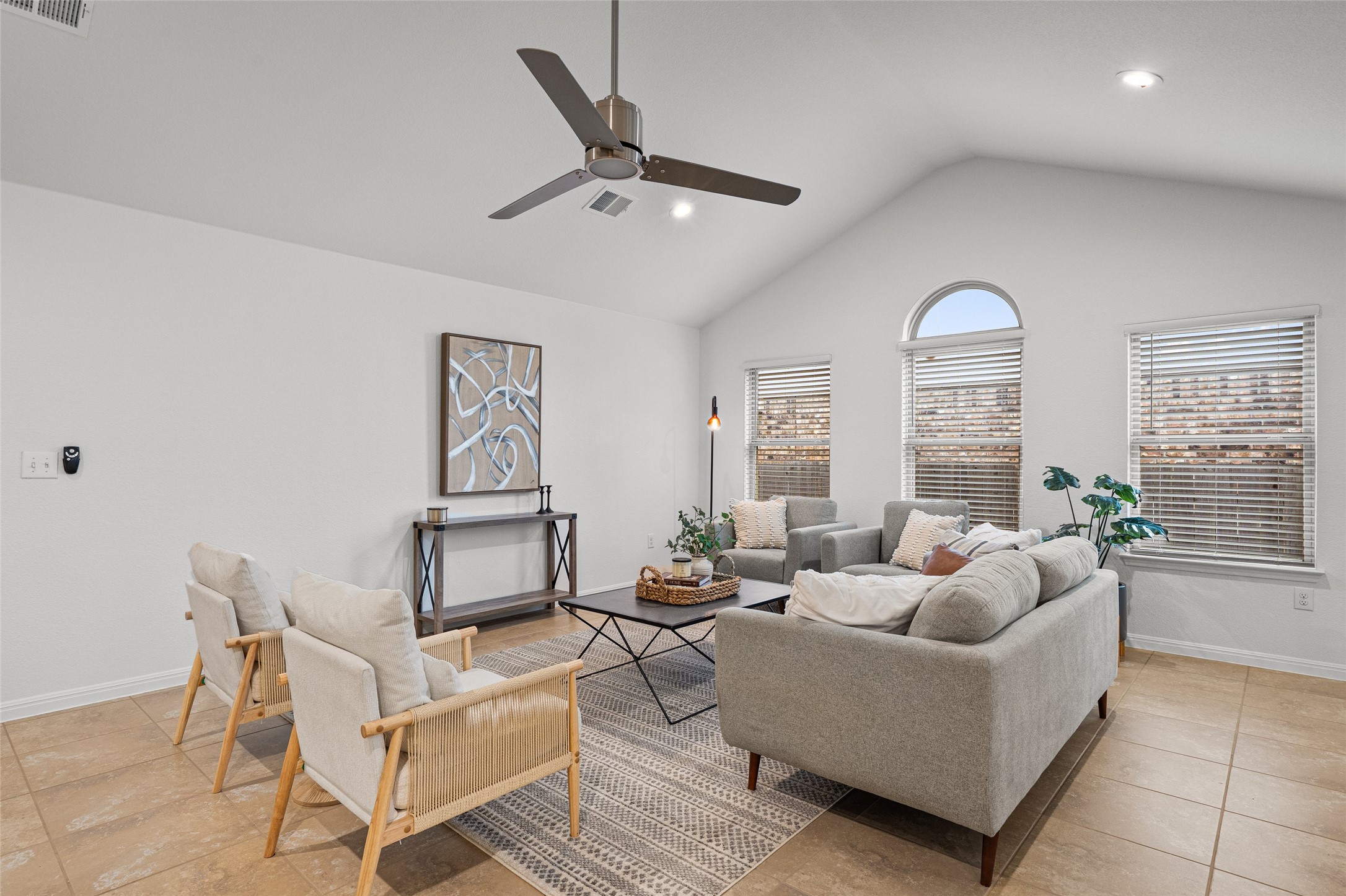 705 Schefer Street Leander, TX 78641 - Photo 7 of 26 a living room with furniture and a window