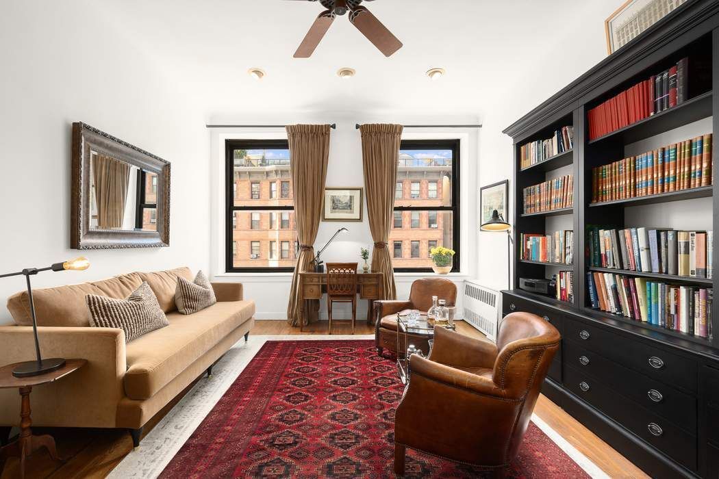 51 West 81st Street, Unit 5A Manhattan, NY 10024 - Photo 3 of 16 a living room with furniture or couch and a bookshelf