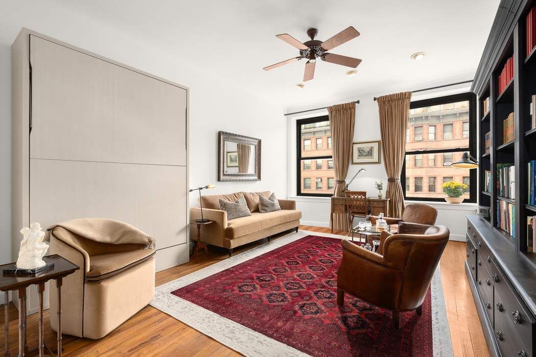 51 West 81st Street, Unit 5A Manhattan, NY 10024 - Photo 4 of 16 a living room with furniture rug and window