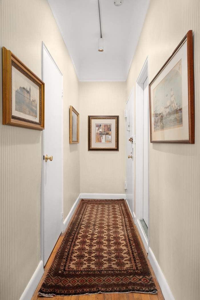 51 West 81st Street, Unit 5A Manhattan, NY 10024 - Photo 8 of 16 a view of a hallway with wooden floor