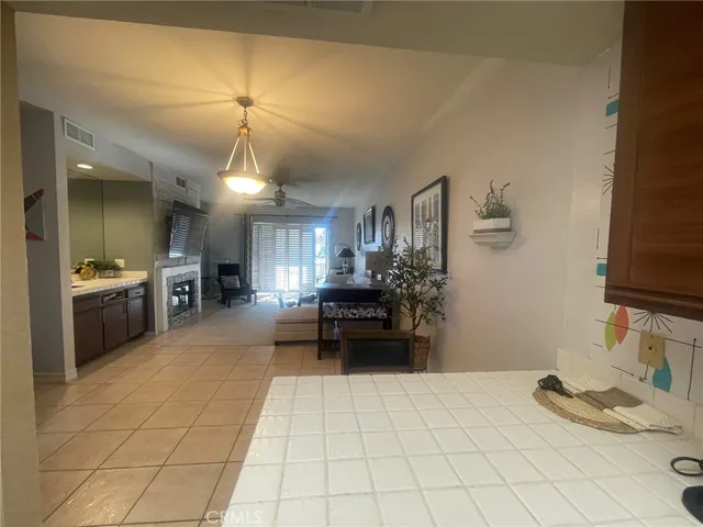 a view of bedroom with wooden floor