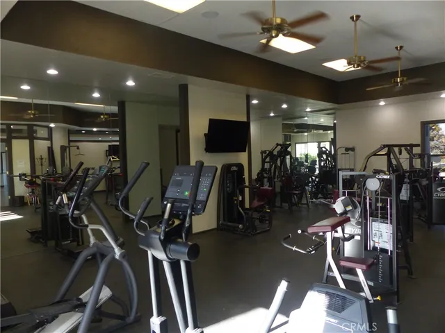 a view of a park with iron fence