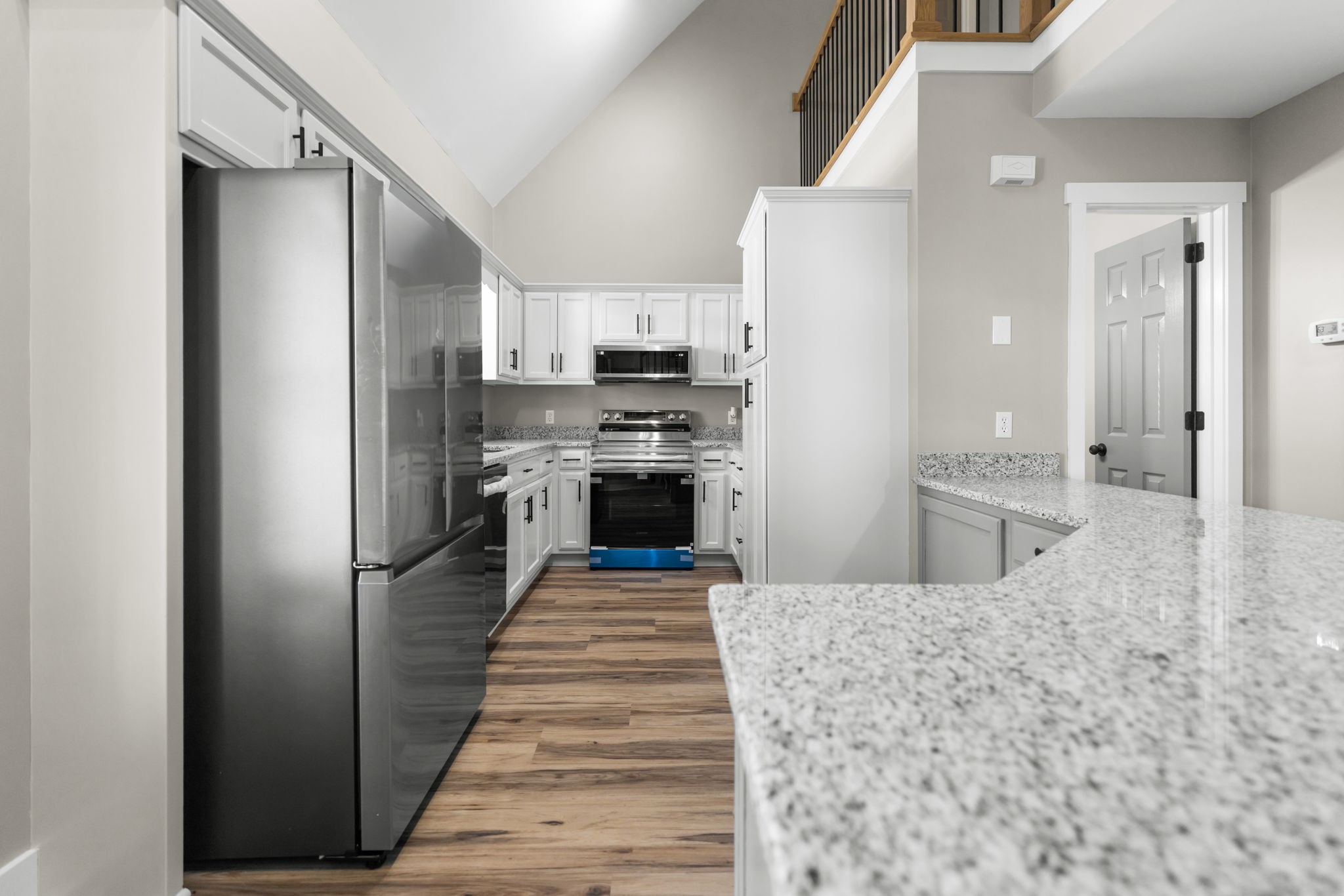 1530 Ridgeview Run Lynchburg, TN 37352 - Photo 11 of 67 a kitchen with stainless steel appliances granite countertop a refrigerator and a stove top oven