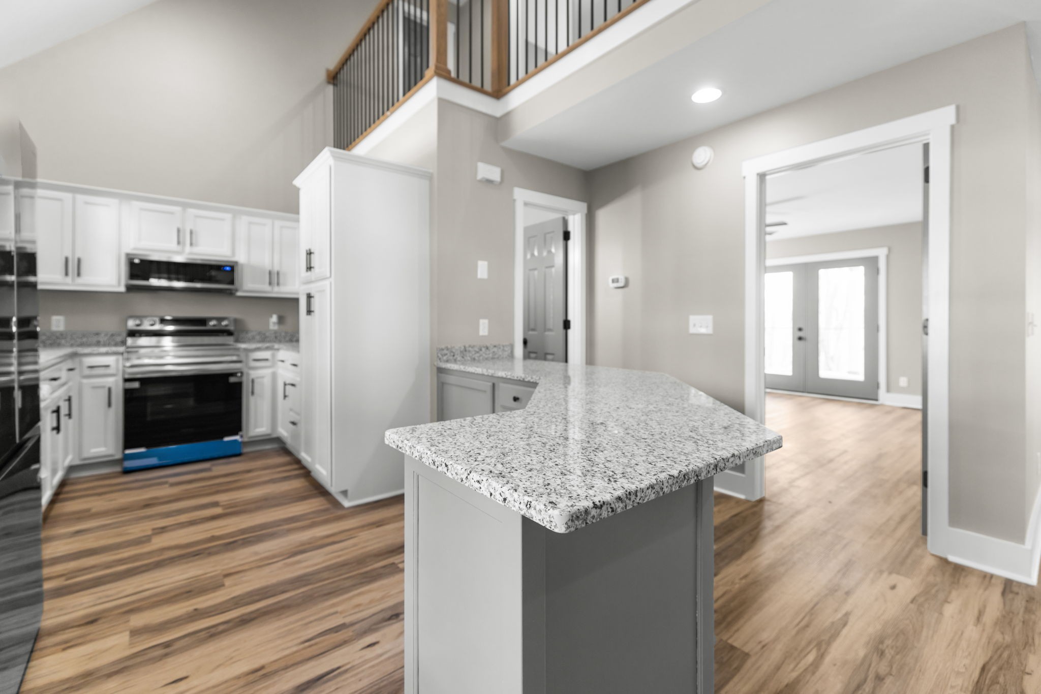 1530 Ridgeview Run Lynchburg, TN 37352 - Photo 13 of 67 a kitchen with stainless steel appliances granite countertop a kitchen island a stove and a refrigerator
