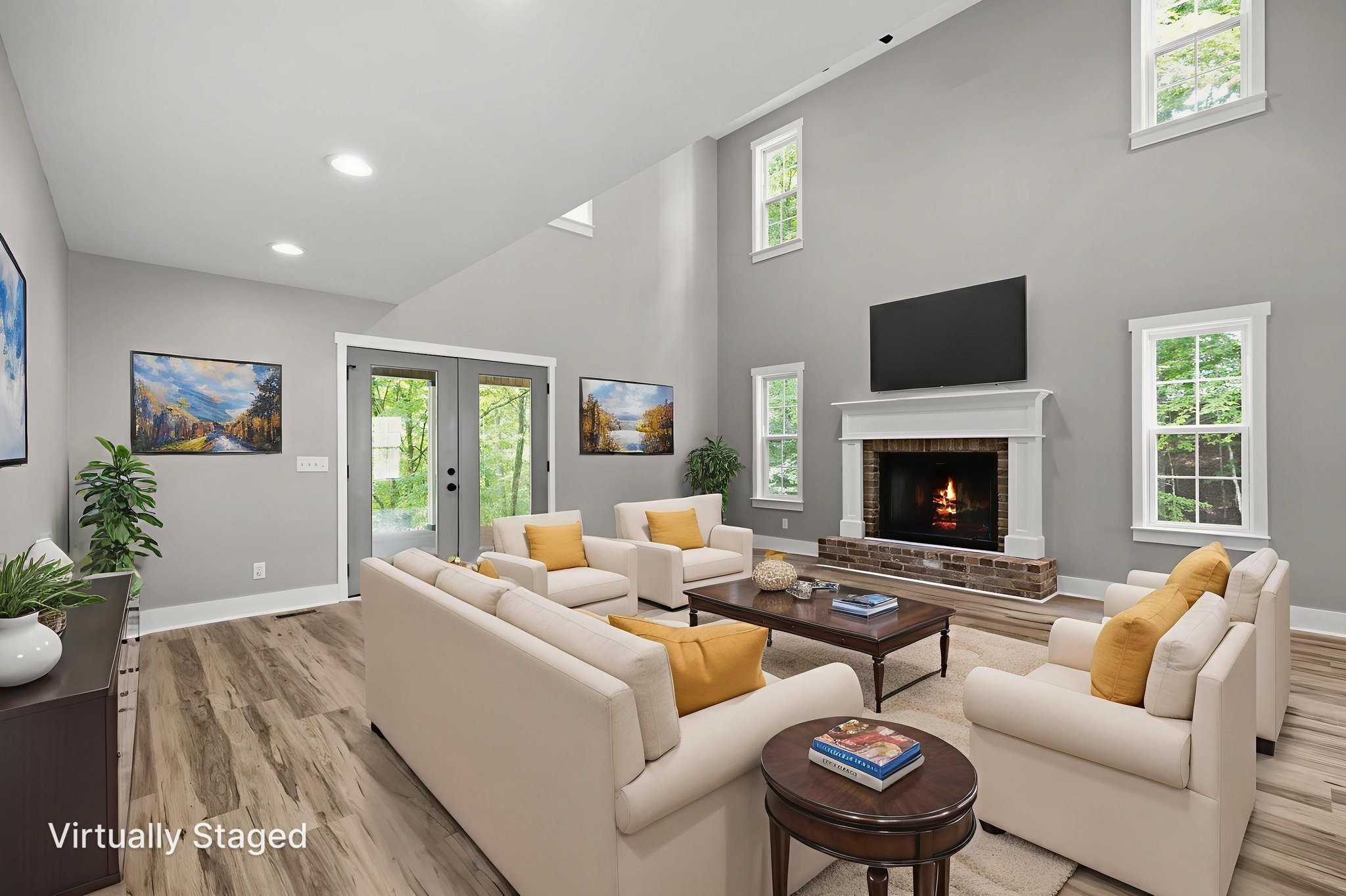 1530 Ridgeview Run Lynchburg, TN 37352 - Photo 15 of 67 a living room with furniture a fireplace and a flat screen tv