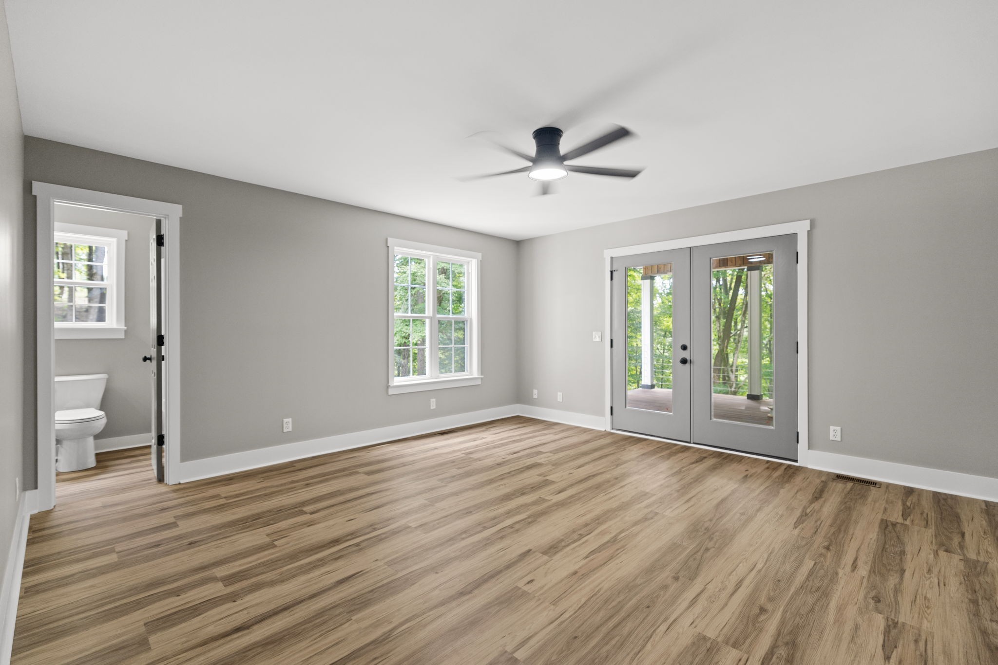 1530 Ridgeview Run Lynchburg, TN 37352 - Photo 23 of 67 a view of an empty room with wooden floor and a window