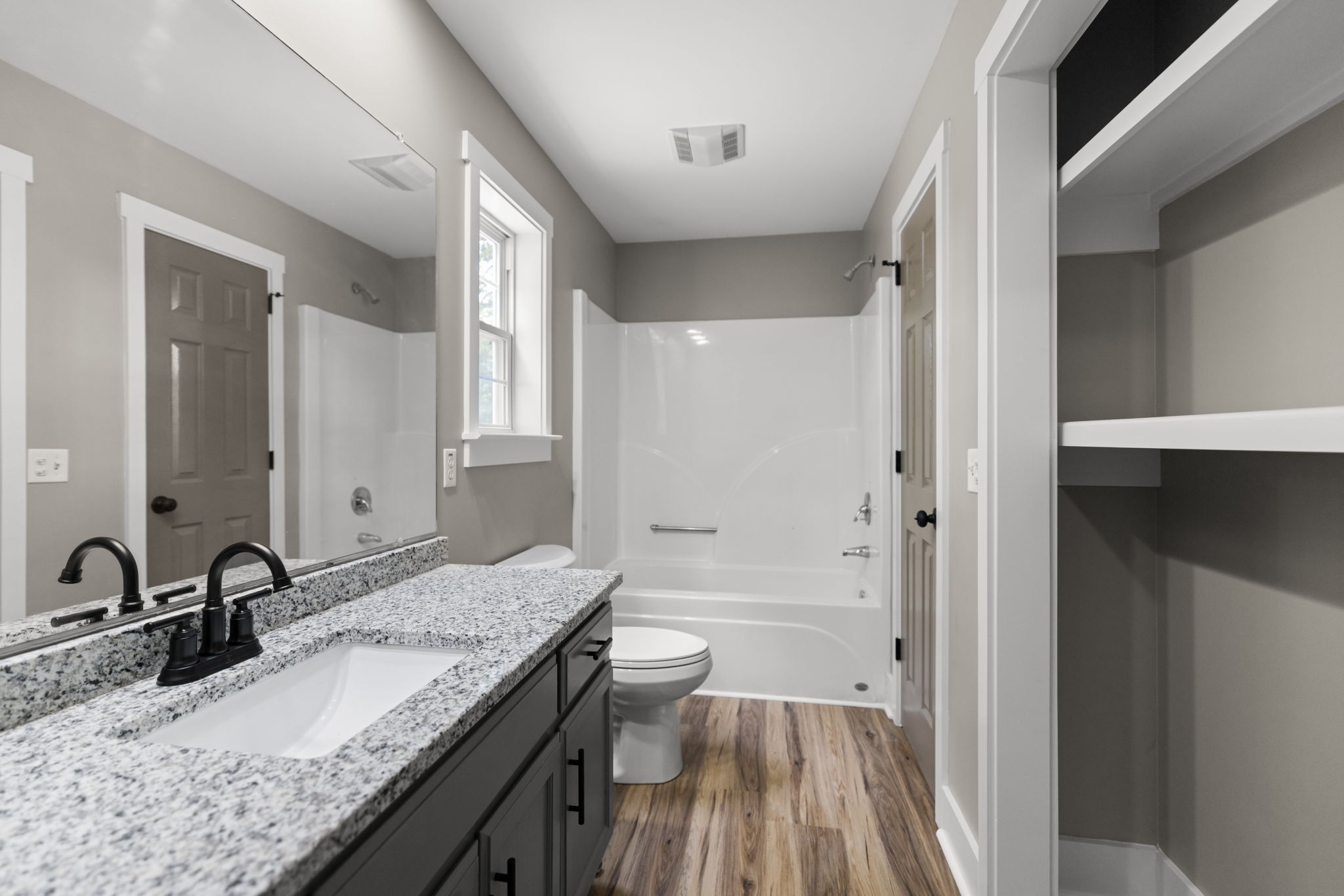 1530 Ridgeview Run Lynchburg, TN 37352 - Photo 27 of 67 a bathroom with a granite countertop sink toilet and shower