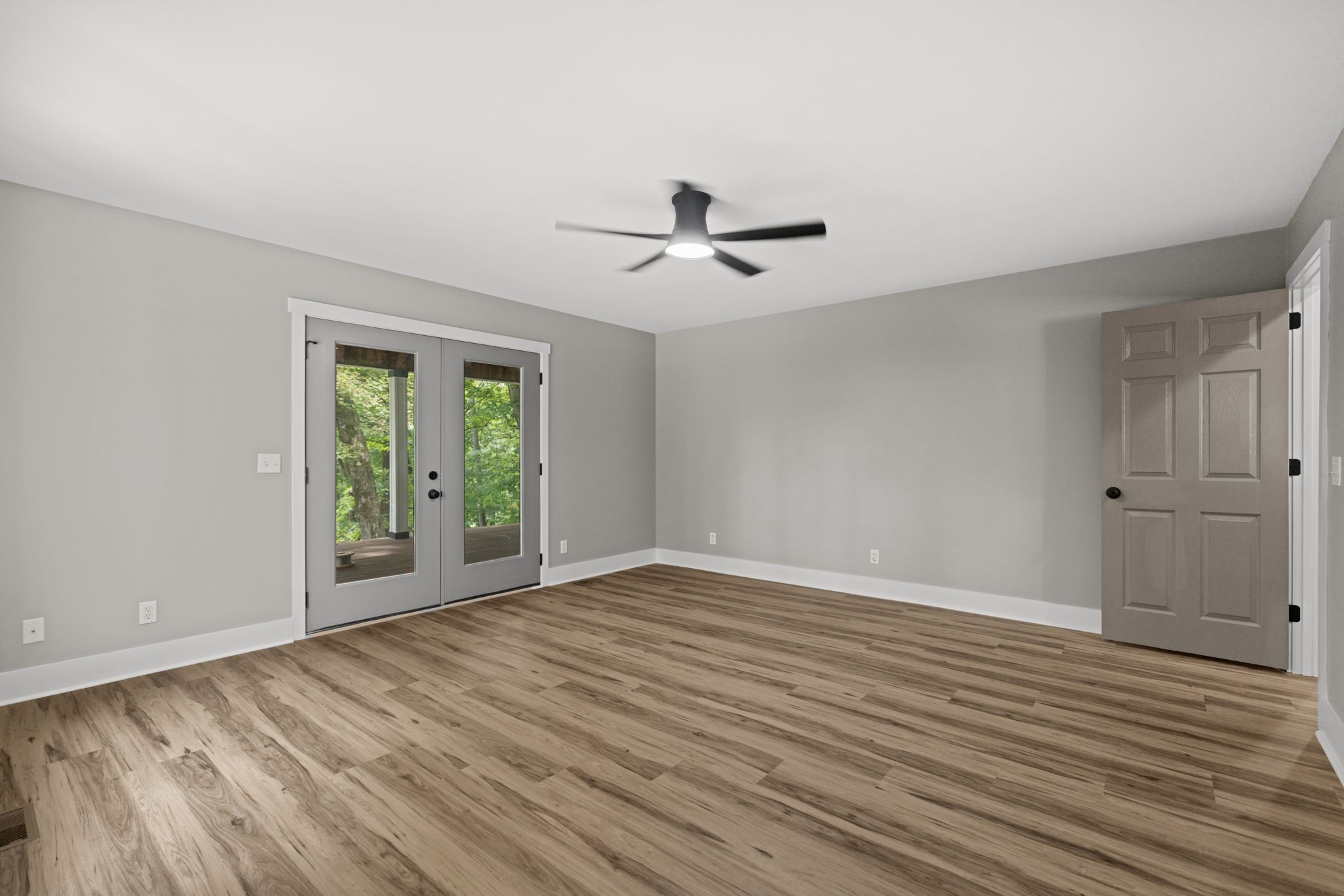 1530 Ridgeview Run Lynchburg, TN 37352 - Photo 28 of 70 a view of an empty room with a window and wooden floor