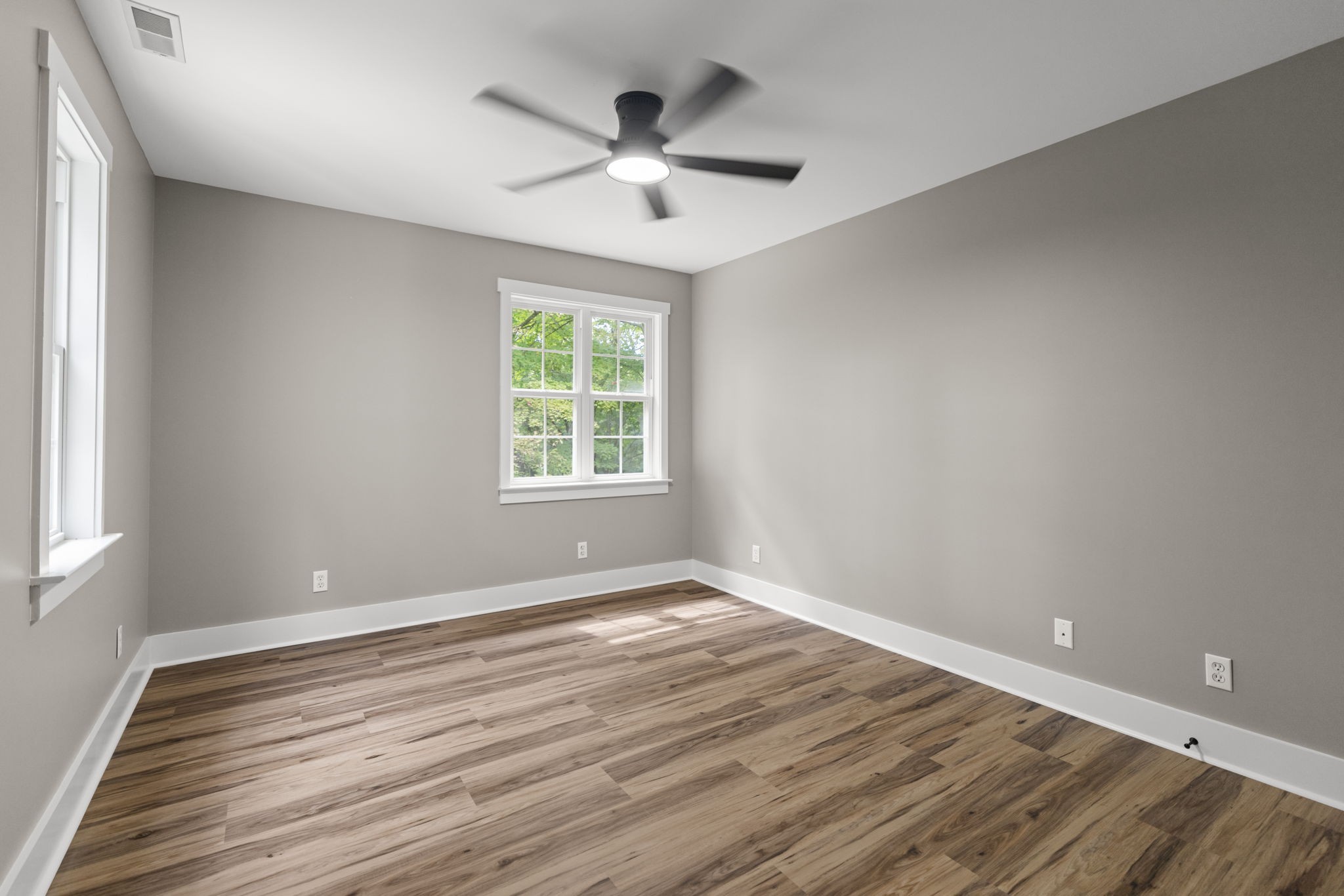 1530 Ridgeview Run Lynchburg, TN 37352 - Photo 34 of 70 an empty room with wooden floor and windows