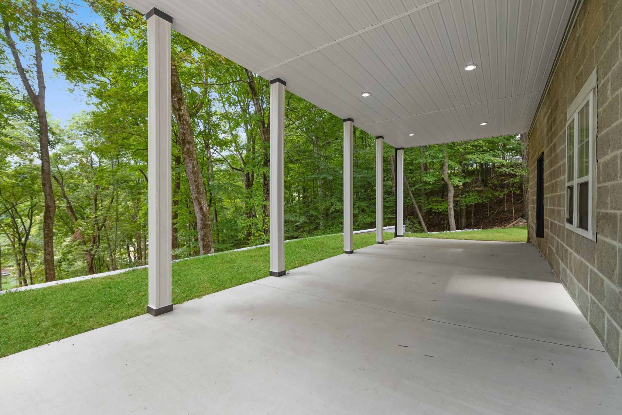 1530 Ridgeview Run Lynchburg, TN 37352 - Photo 43 of 67 a view of a house with backyard and floor to ceiling windows