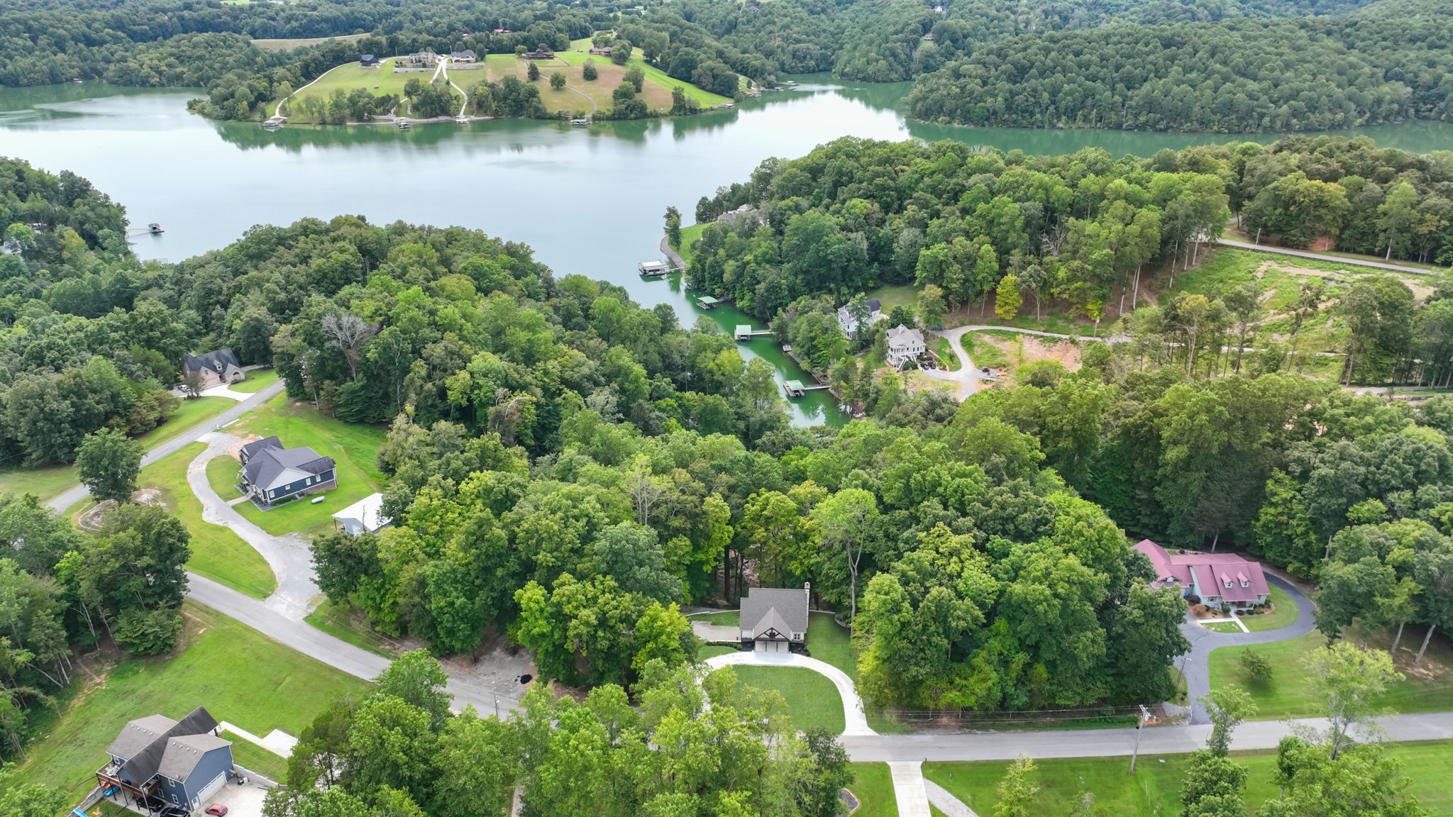1530 Ridgeview Run Lynchburg, TN 37352 - Photo 54 of 67 an aerial view of lake residential house with outdoor space and trees around
