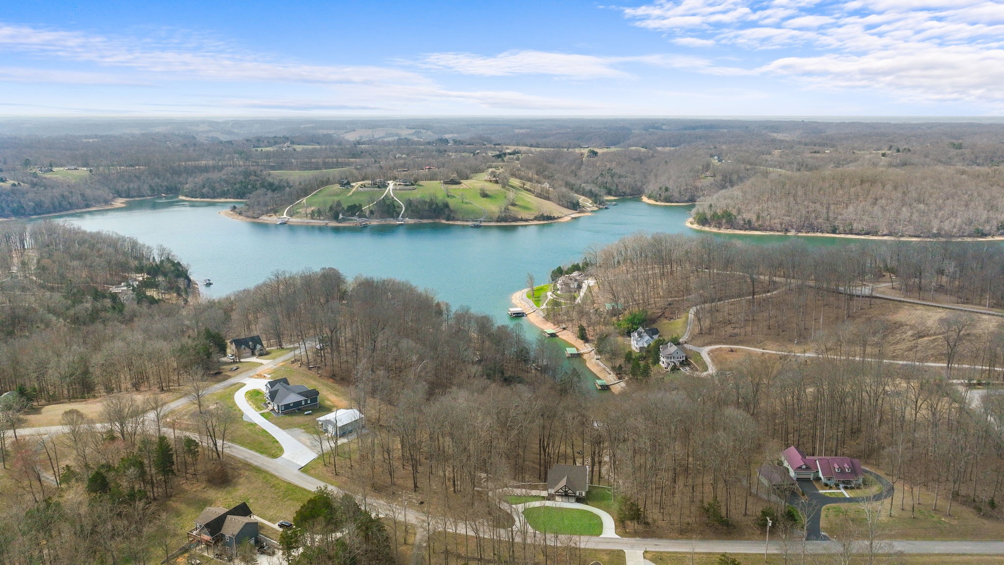 1530 Ridgeview Run Lynchburg, TN 37352 - Photo 64 of 67 an aerial view of a house with a lake view