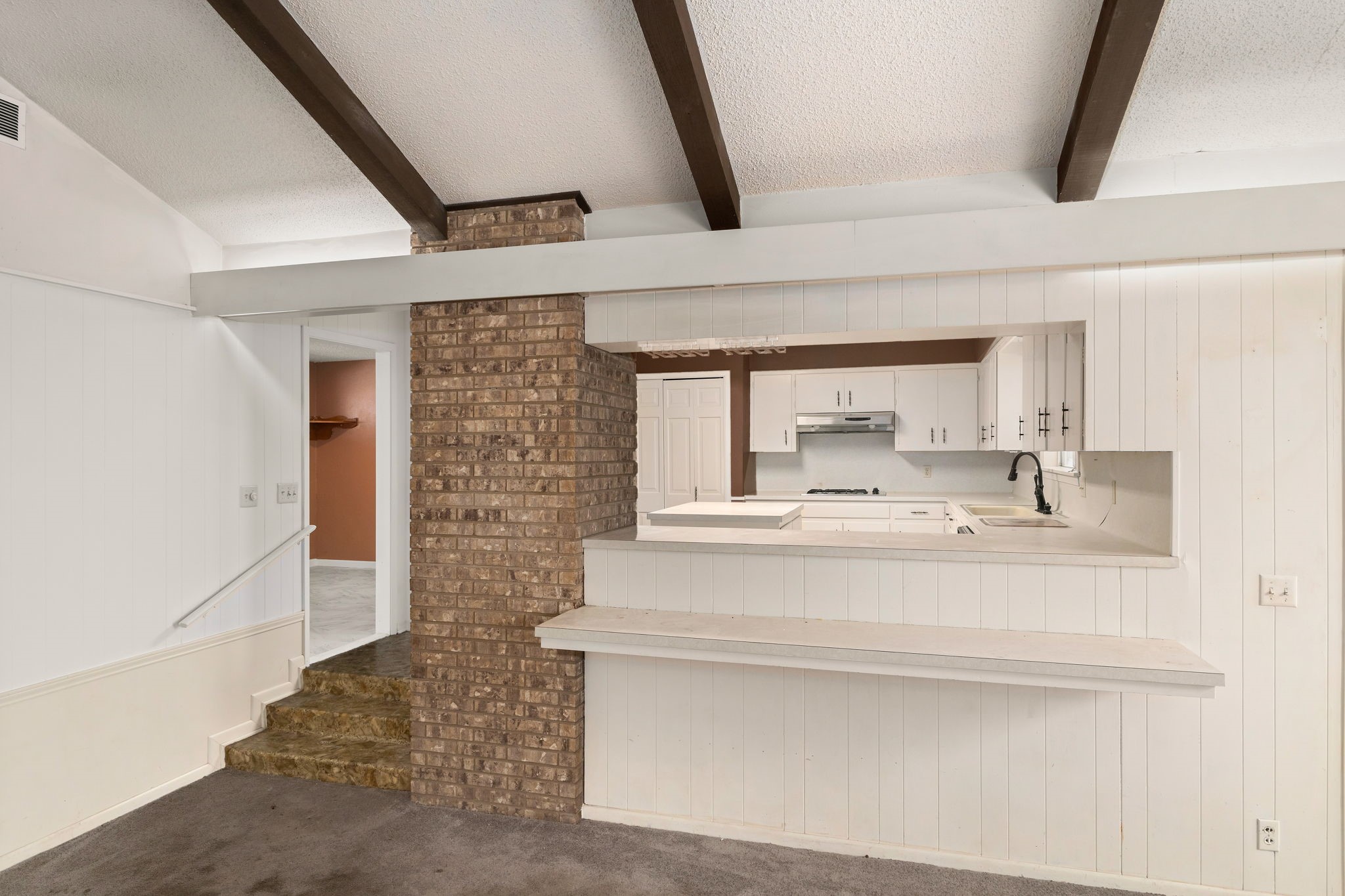 202 Kallus Street Schulenburg, TX 78956 - Photo 15 of 36 a bathroom with a sink a mirror and shower