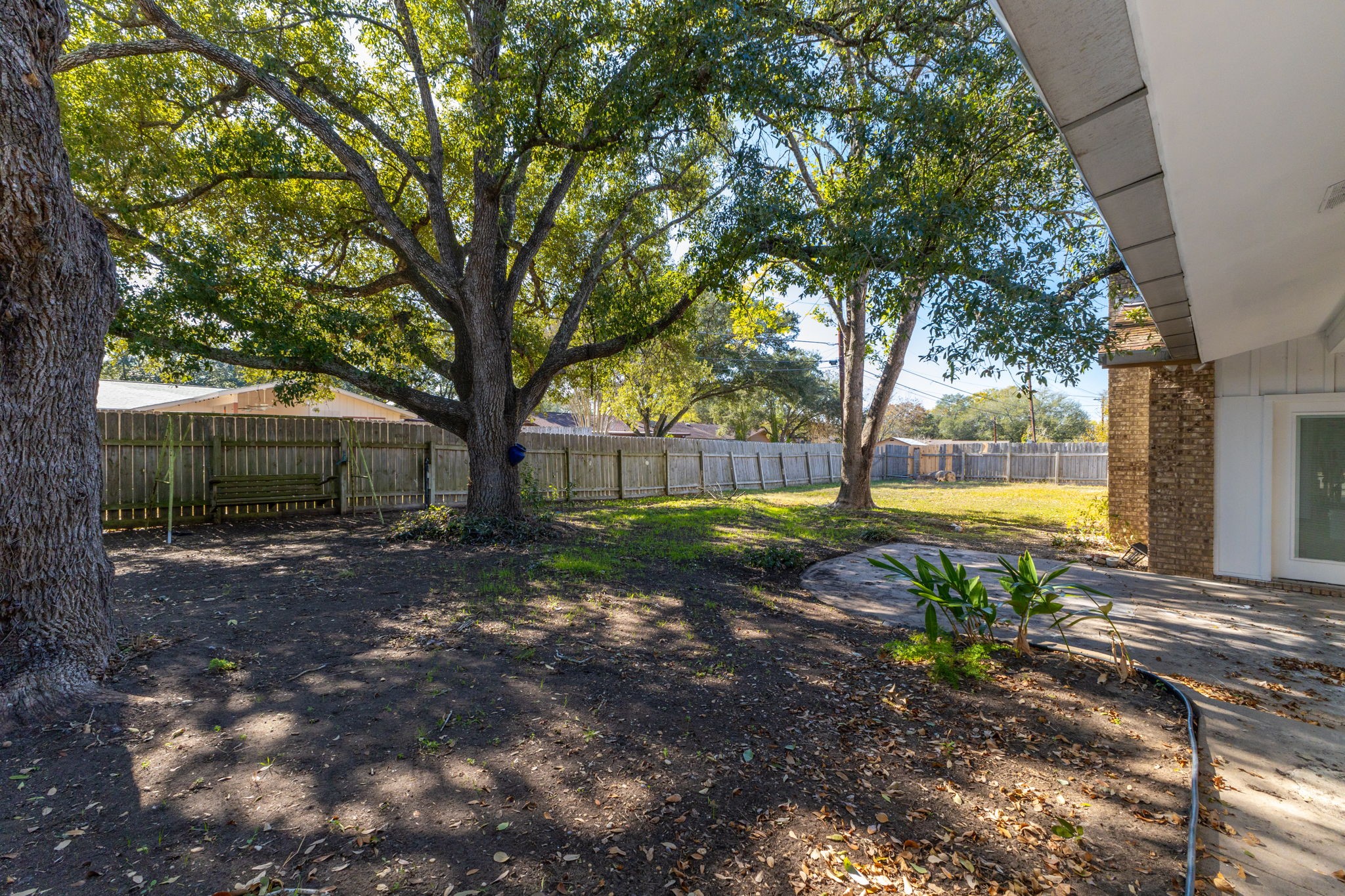 202 Kallus Street Schulenburg, TX 78956 - Photo 35 of 36 a view of a yard with tree s