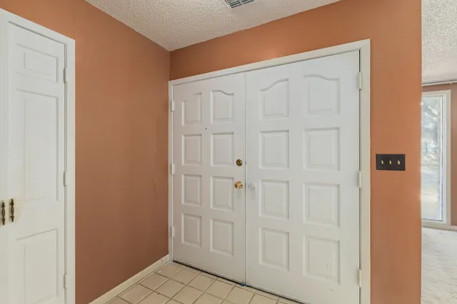 a view of a livingroom with wooden floor