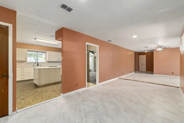 a bathroom with a bathtub and a sink
