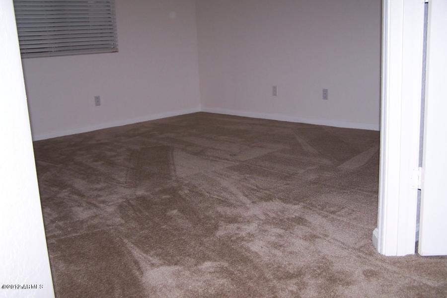 8634 West Riley Road Tolleson, AZ 85353 - Photo 7 of 12 a view of empty room