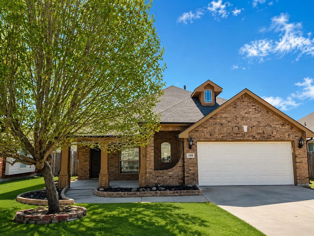 548 Kerry Street Crowley, TX 76036 - Photo 1 of 35 a front view of a house with a yard