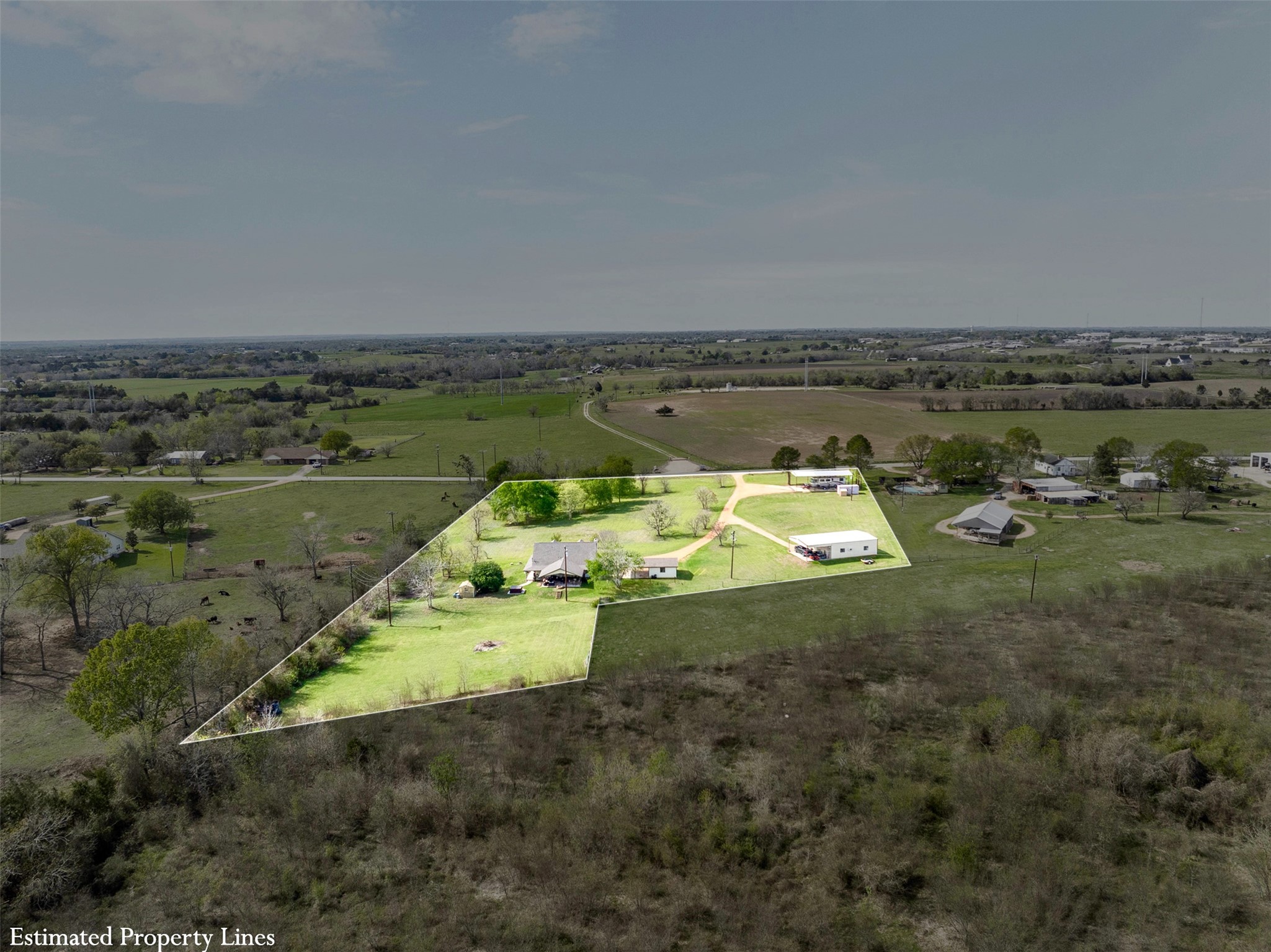 999 Salem Road Brenham, TX 77833 - Photo 30 of 31 an aerial view of a house with a yard