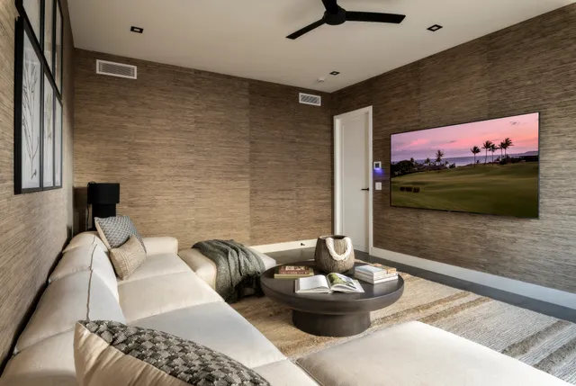 a living room with furniture and a rug