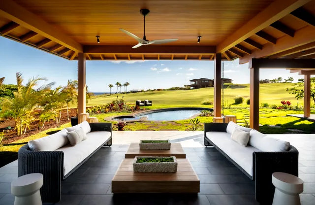 a view of swimming pool with outdoor seating