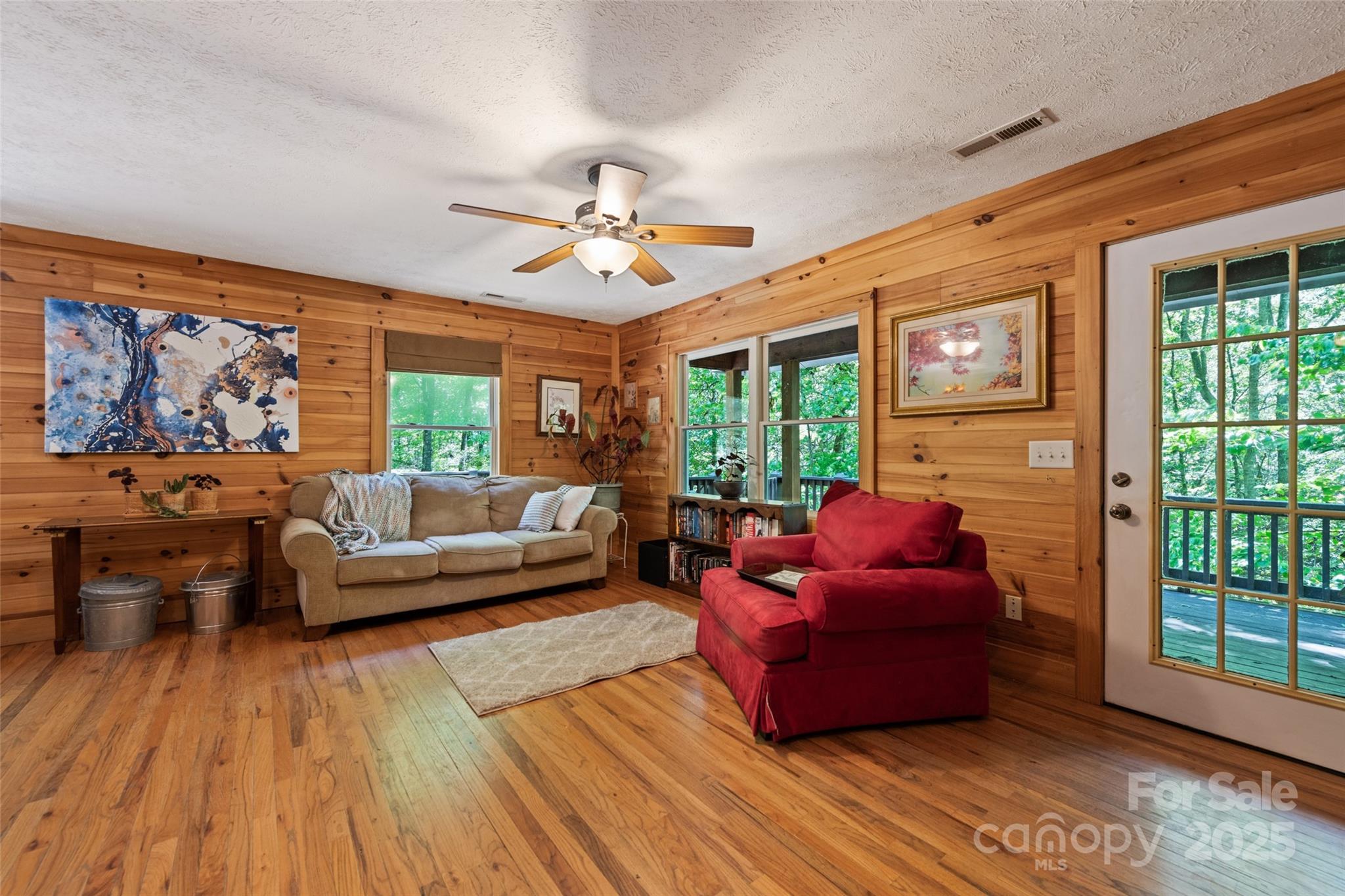 823 Turtle Creek Road Sylva, NC 28779 - Photo 10 of 38 a living room with furniture and a large window
