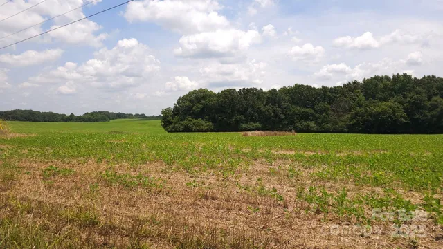 a view of a lake with a big yard