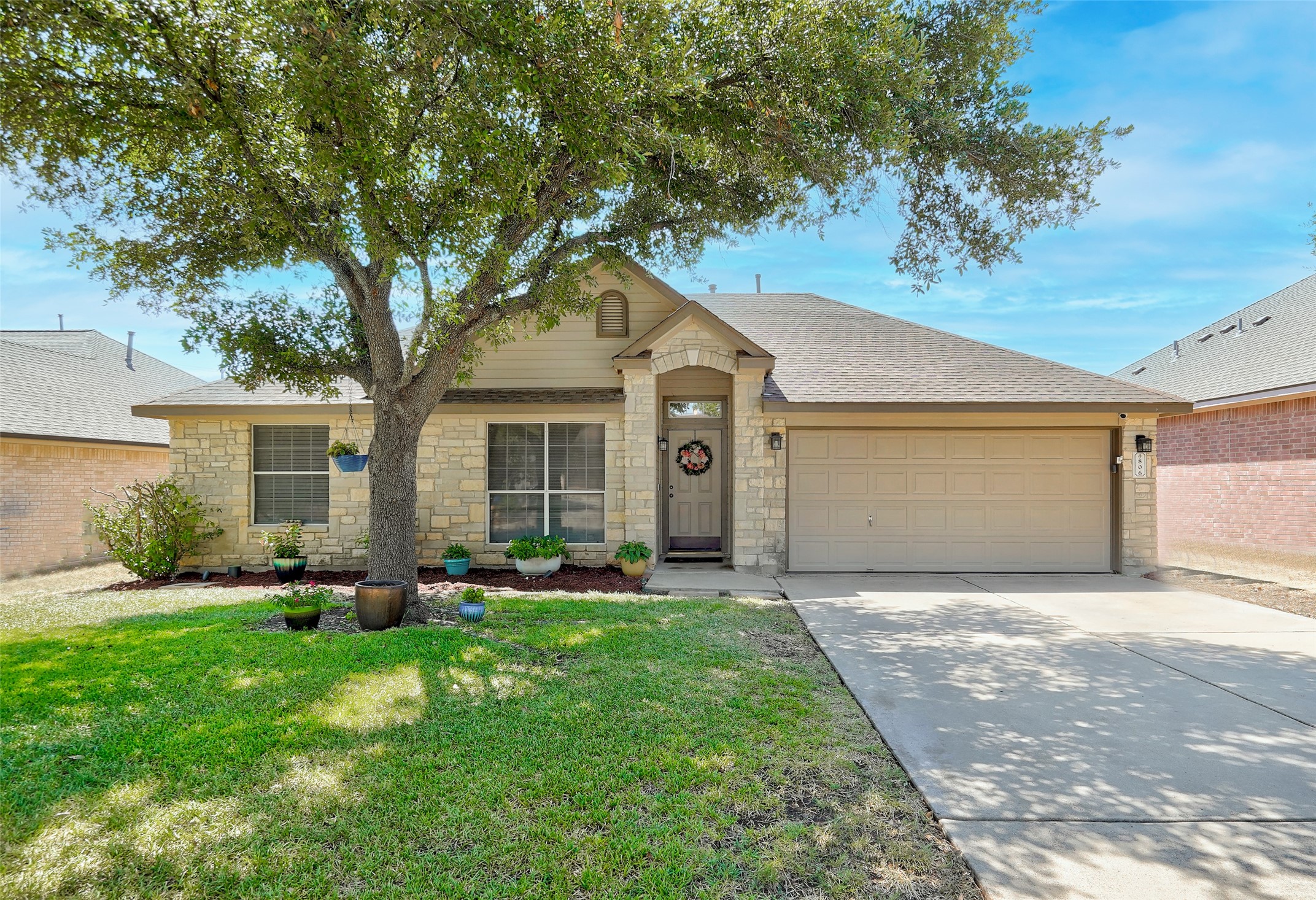 806 Ridge View Drive Leander, TX 78641 - Photo 1 of 1 a front view of a house with a yard and trees