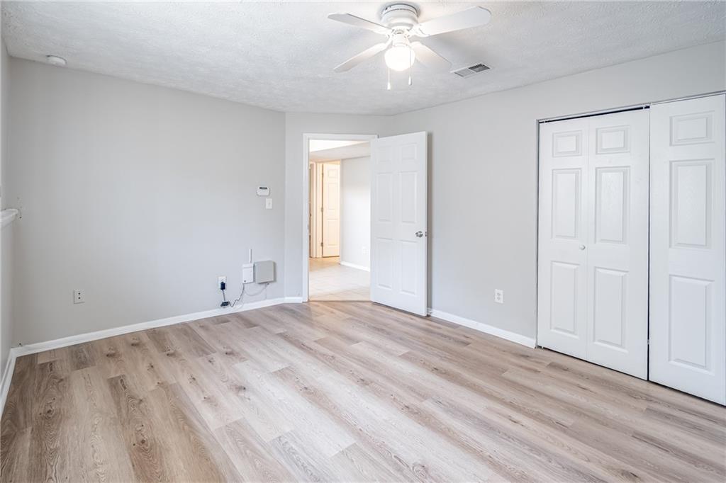 2407 Redfield Drive Norcross, GA 30071 - Photo 26 of 37 wooden floor in an empty room