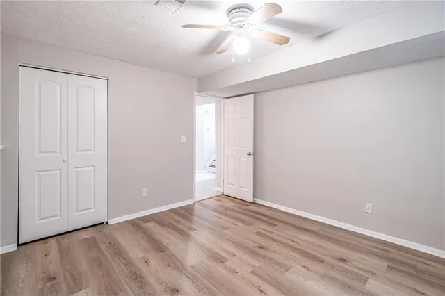 a bathroom with a sink toilet and vanity