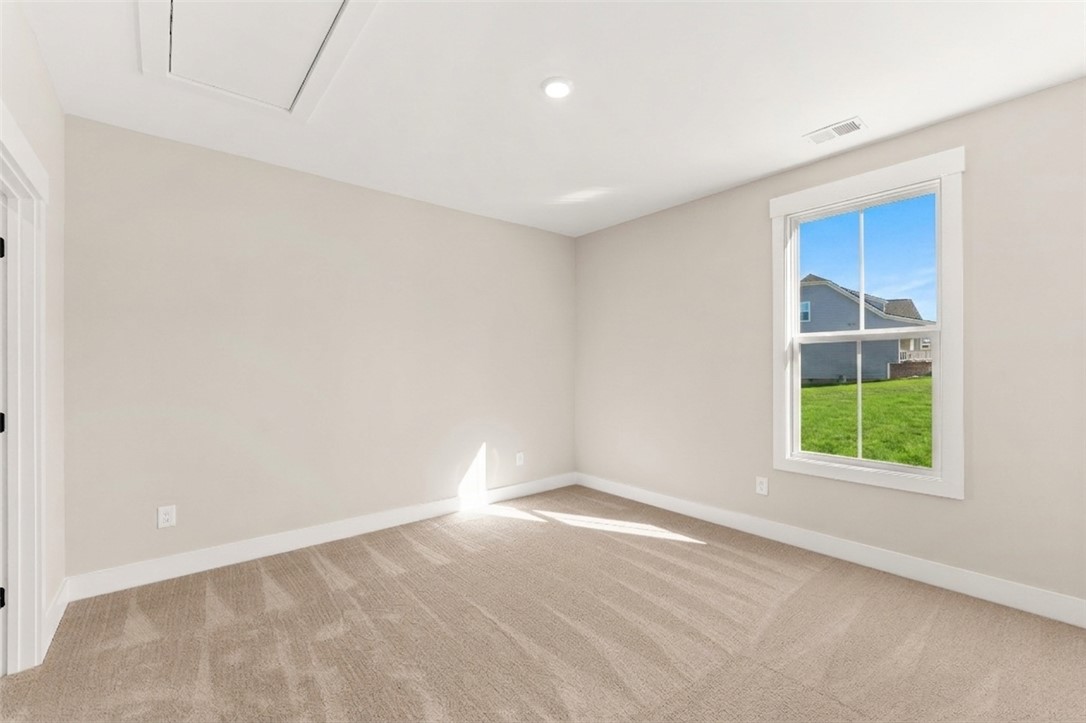 334 Summerall Drive Anderson, SC 29621 - Photo 9 of 28 This bright and airy room offers a versatile space, ideal for various needs.