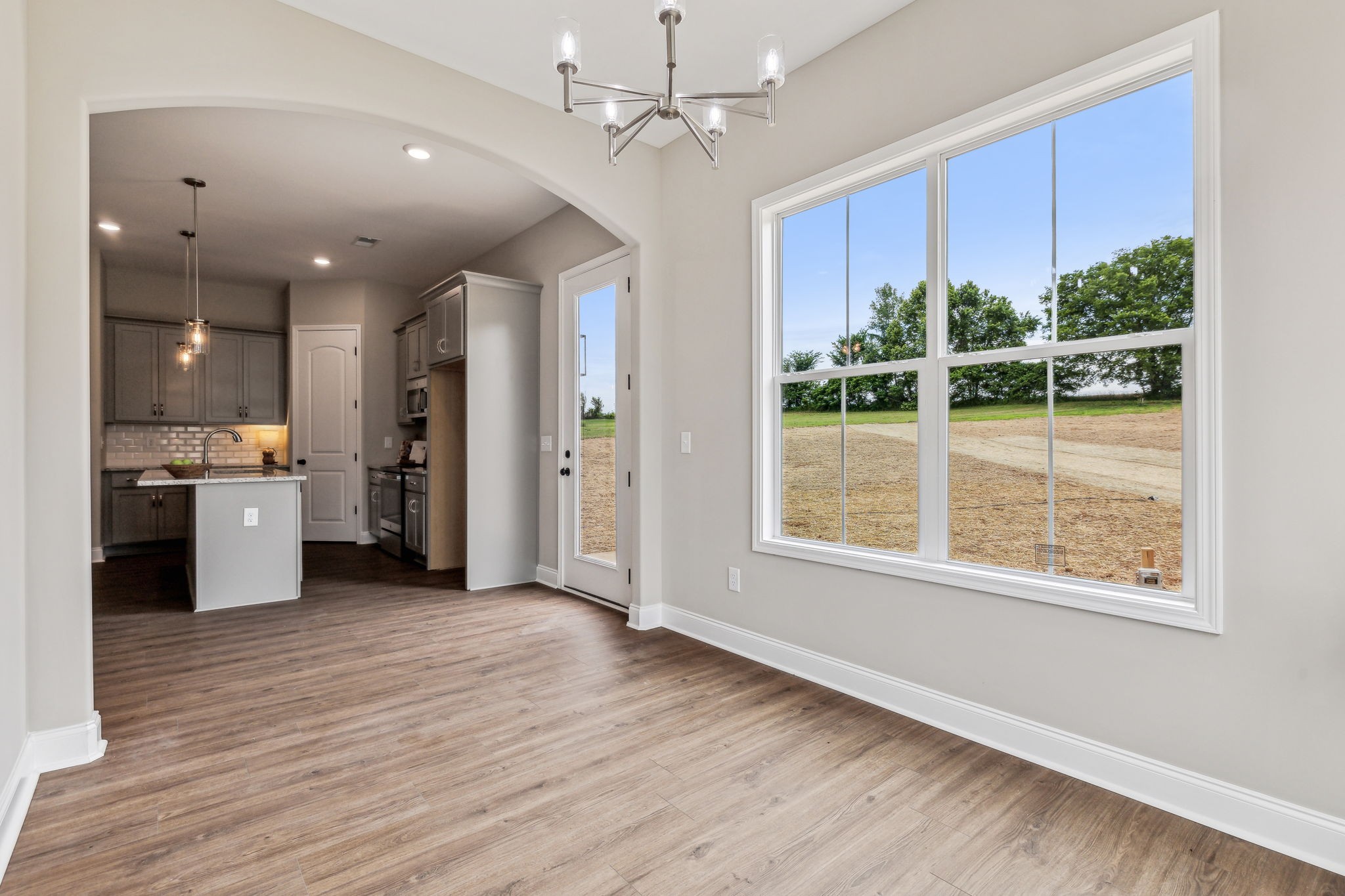 5751 Youngville Road Springfield, TN 37172 - Photo 18 of 45 a view of a kitchen with furniture and a window