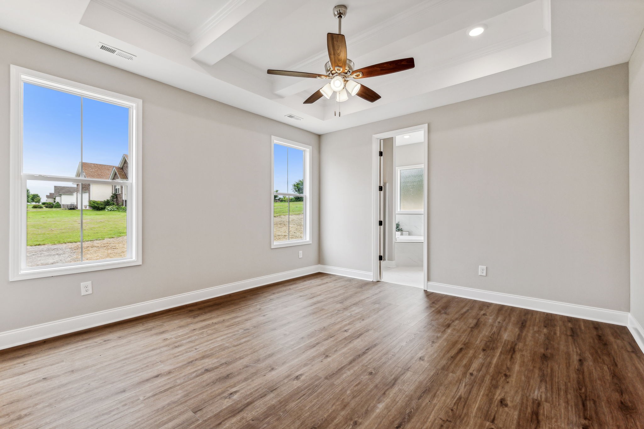 5751 Youngville Road Springfield, TN 37172 - Photo 25 of 45 a view of an empty room with a window and wooden floor