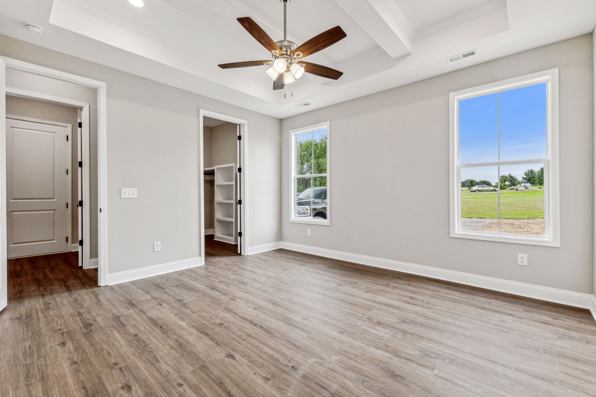 5751 Youngville Road Springfield, TN 37172 - Photo 34 of 45 an empty room with wooden floor and windows