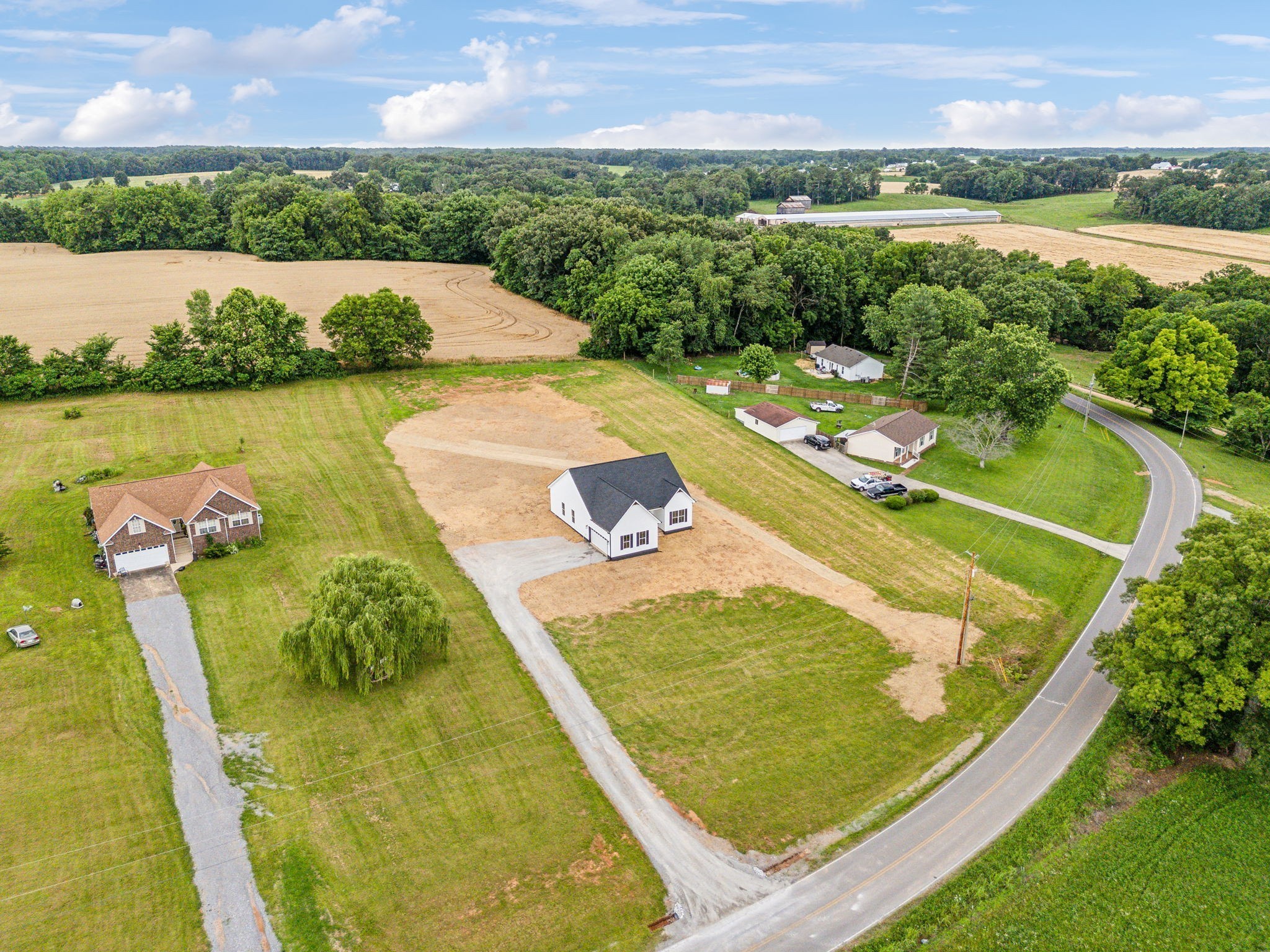 5751 Youngville Road Springfield, TN 37172 - Photo 39 of 45 an aerial view of a house with a garden and lake view