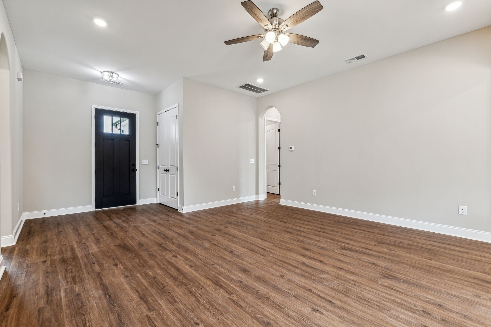 5751 Youngville Road Springfield, TN 37172 - Photo 8 of 45 a view of an empty room with wooden floor