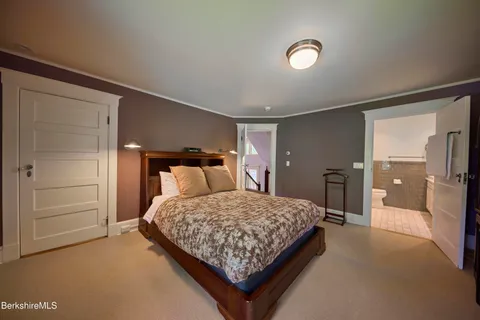 a view of room with stairs and a window