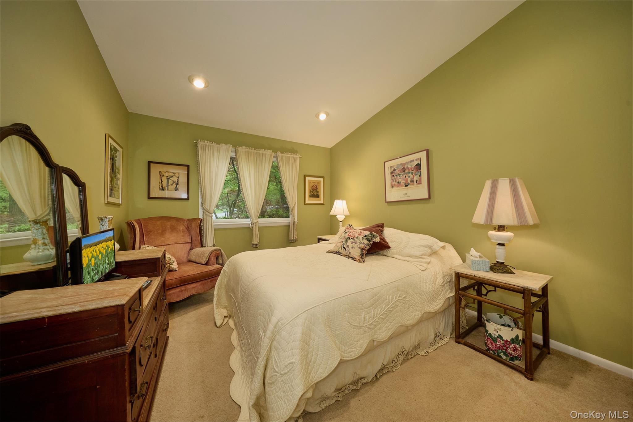 31 Greenlawn Road Katonah, NY 10536 - Photo 20 of 47 Bedroom featuring light carpet, baseboards, vaulted ceiling, and recessed lighting