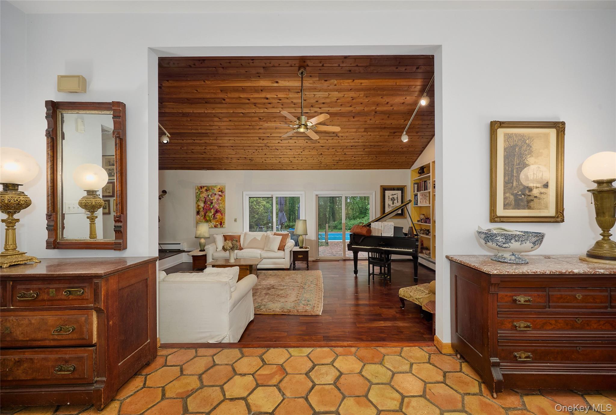 31 Greenlawn Road Katonah, NY 10536 - Photo 2 of 47 Living room with vaulted ceiling, wood ceiling, a ceiling fan, rail lighting, and light wood-type flooring