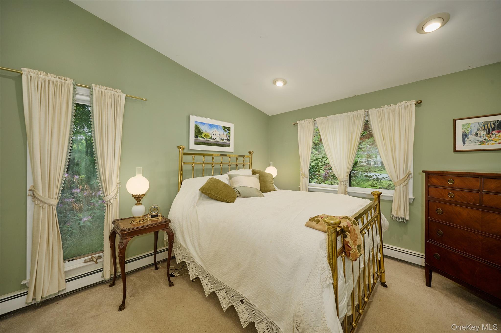 31 Greenlawn Road Katonah, NY 10536 - Photo 21 of 47 Carpeted bedroom with vaulted ceiling, baseboard heating, recessed lighting, and baseboards