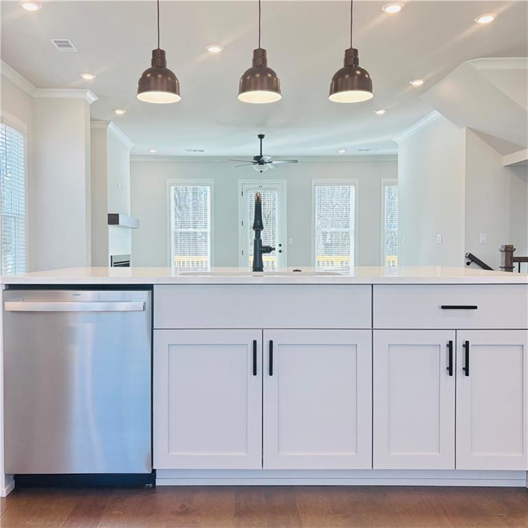 163 Basil Street Cumming, GA 30040 - Photo 11 of 56 a bathroom with a sink and a mirror