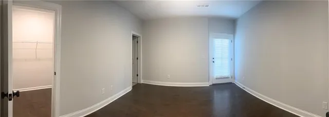 a bathroom with a toilet sink and shower