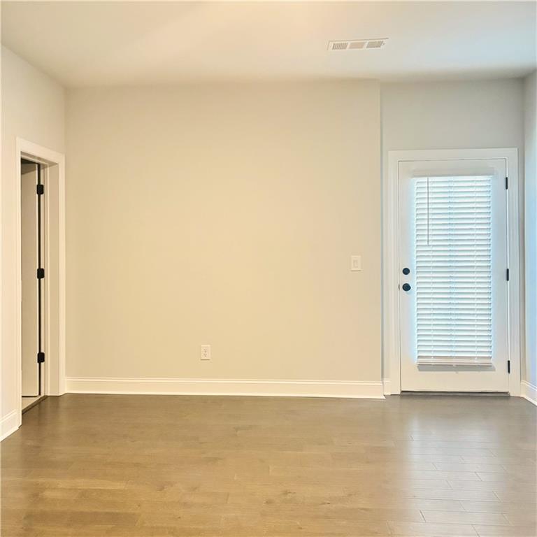 163 Basil Street Cumming, GA 30040 - Photo 27 of 56 a view of empty room