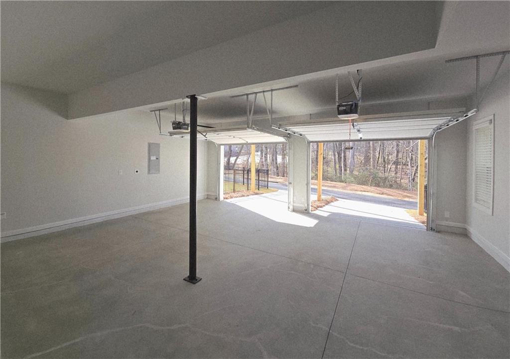 163 Basil Street Cumming, GA 30040 - Photo 30 of 56 a view of empty room with wooden floor