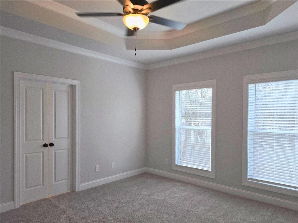 163 Basil Street Cumming, GA 30040 - Photo 33 of 56 a view of an empty room with a window