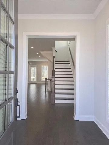 a view of a hallway with a white walls