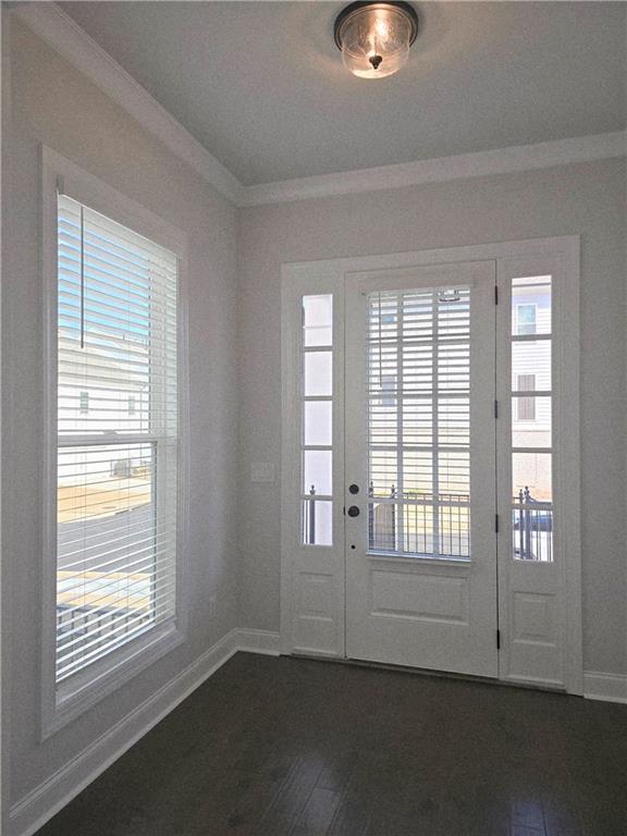 163 Basil Street Cumming, GA 30040 - Photo 6 of 56 an empty room with a empty space and windows