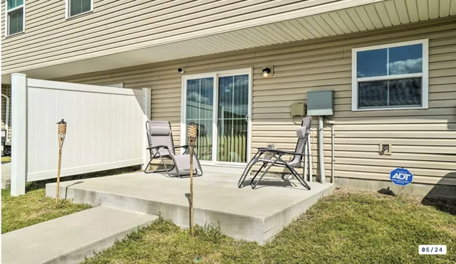 a house view with a backyard space