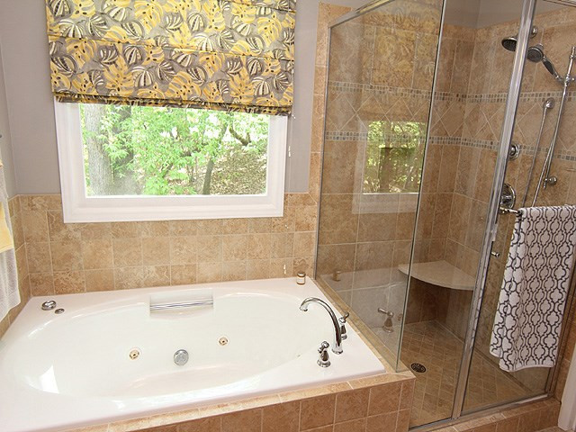 12304 Galway Drive Raleigh, NC 27613 - Photo 16 of 25 Gorgeous fully remodeled master bath with Granite and tile. Master Bath/Spa