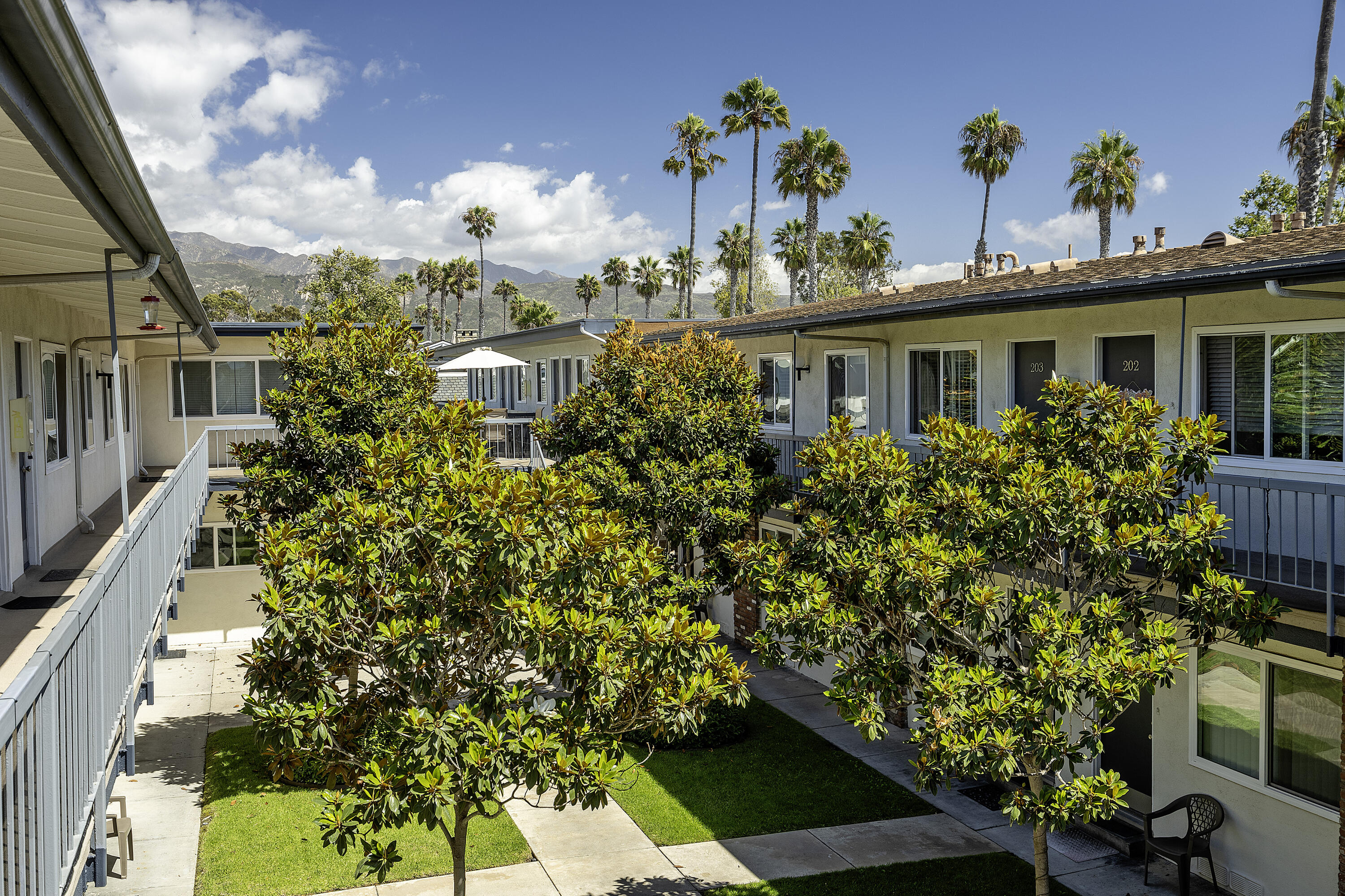 4980 Sandyland Road, Unit 203 Carpinteria, CA 93013 - Photo 13 of 23 a front view of a house with a yard